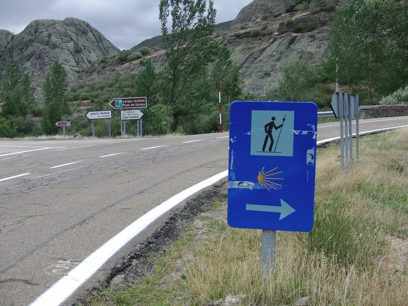 signpost Camino de Santiago and Picos de Europa