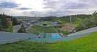#4: The Lahti ski jump hill: Plastic on the left for summer jumping, a 50m swimming pool on the right!