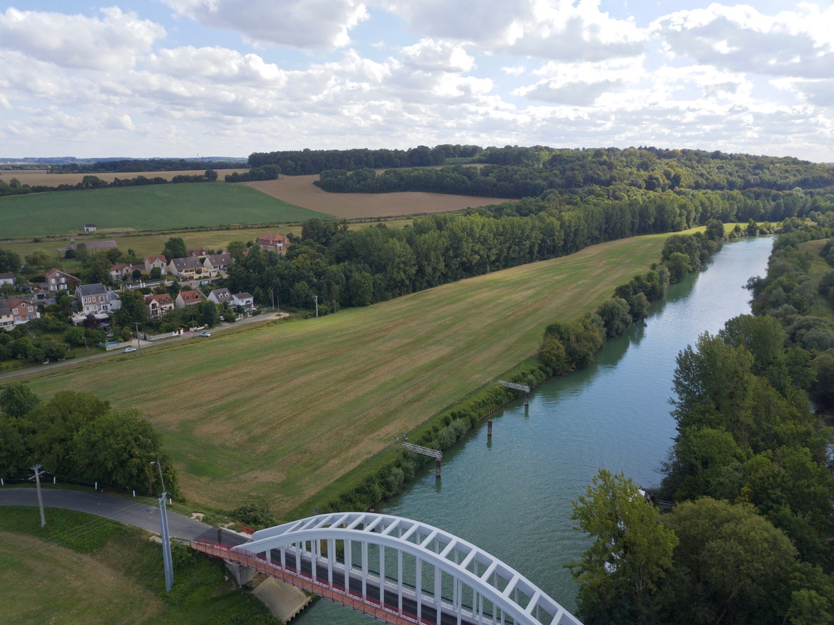 View South (across the bridge, along the Marne River), from 60m above the point