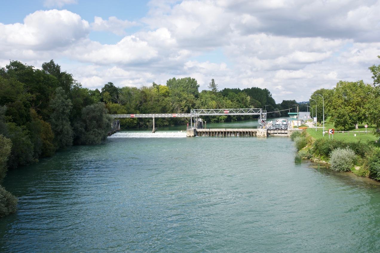 Looking North from the bridge towards a lock on the Marne.  The confluence point is 80m away at the far left of the photo, on the river bank