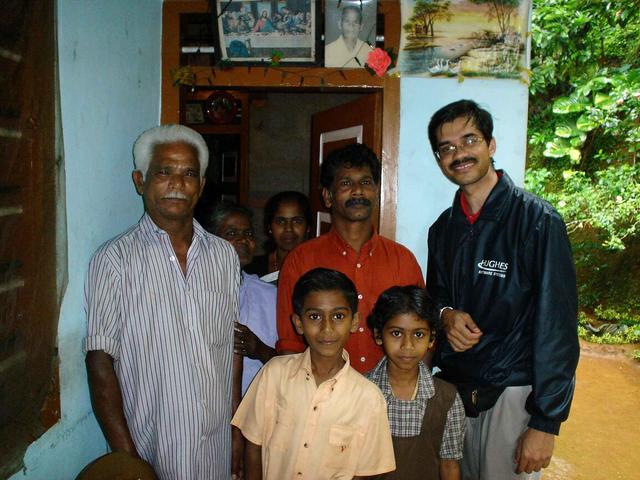 Lakshman with the Varghese family