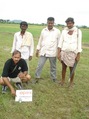 #9: Mr.Gunachandran with Vasu and two locals