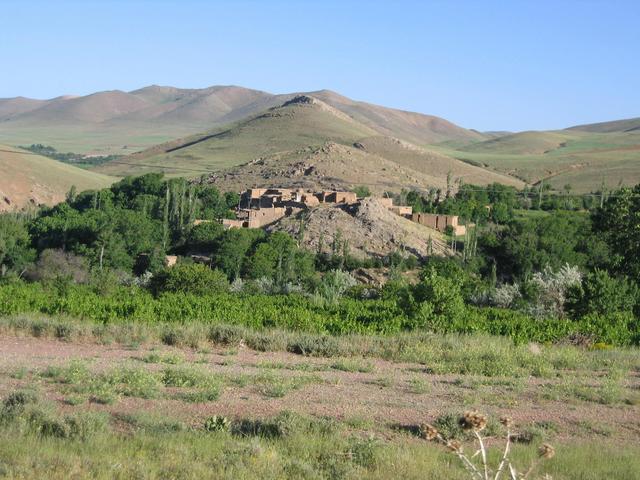 A village by the road almost 10 km east of the point