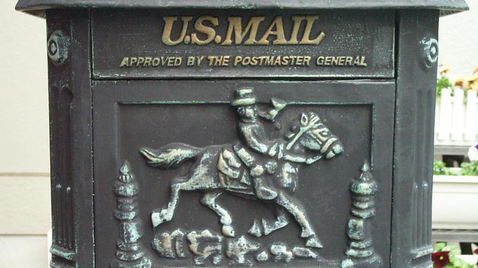 Shows the front side of the residences' mailbox.
