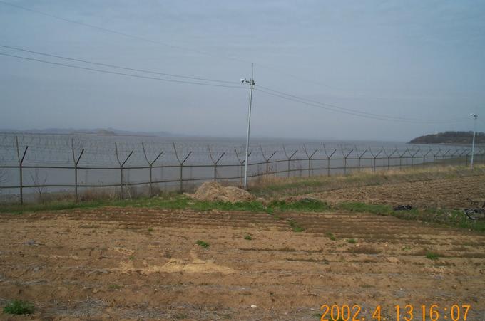 Barbed wires prohibit the possible intrusion from across the sea.