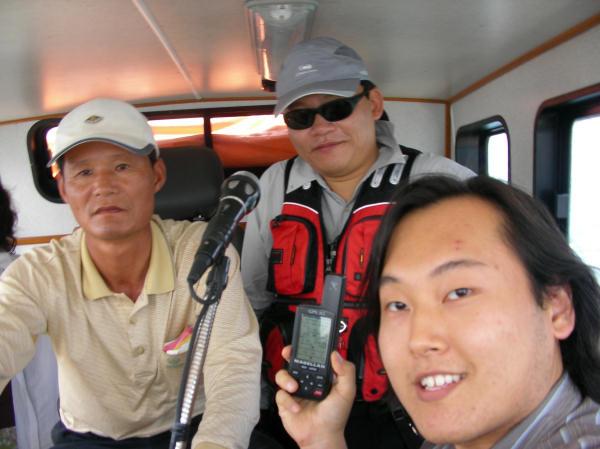 Visitors (left to right): ship's captain (Hae-Yun Choi), a fisherman, and me (Wesley)
