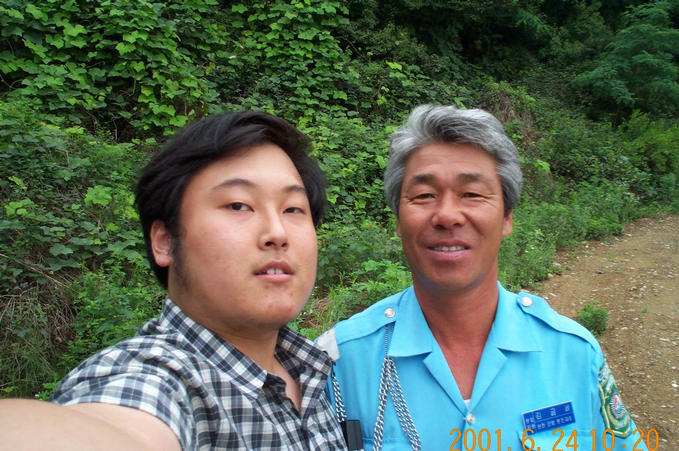 A photo with the kind taxi driver who helped me in finding the confluence.