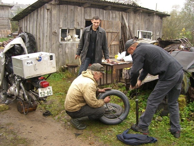 Fixing a flat tire in Russia