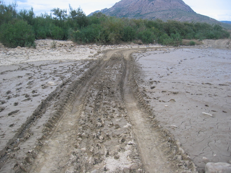 Muddy road that suggests an approach by 4WD