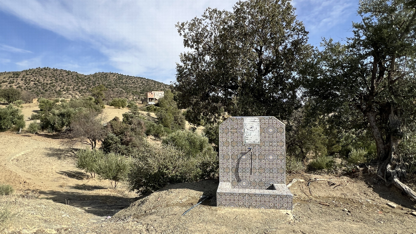 One of the village fountains