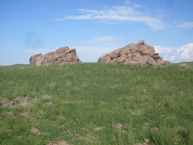 Rock outcrop landmark to the east