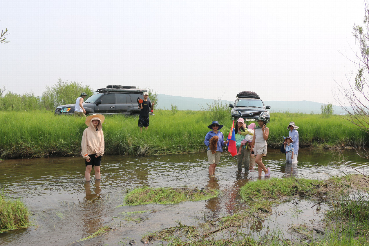 Team members in the Duch river