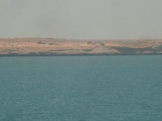 #1: Peninsula of Cap Blanc's coastline seen from the Confluence