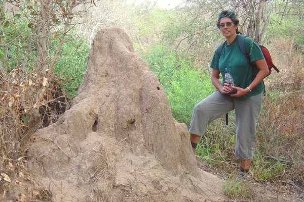 Marieta at an anthill along the hike