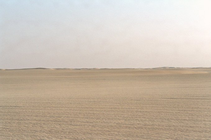 View to the south. Small dunes at the horizon.