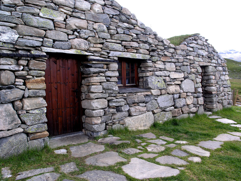 Amazing dry rock masonry work on a set of very old but beautifully restored cabins by lake Vivass