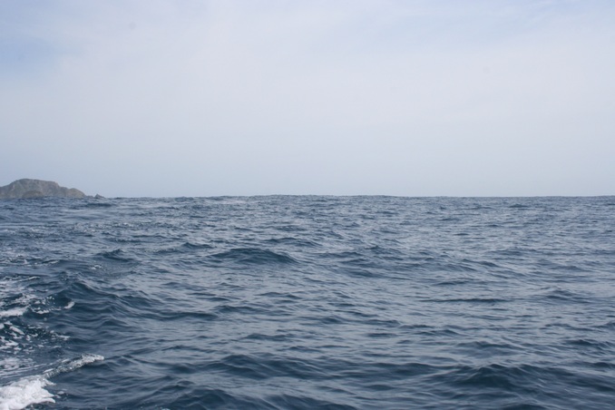 Mostly sea with the top of Cavalli Islands visible to the north-west