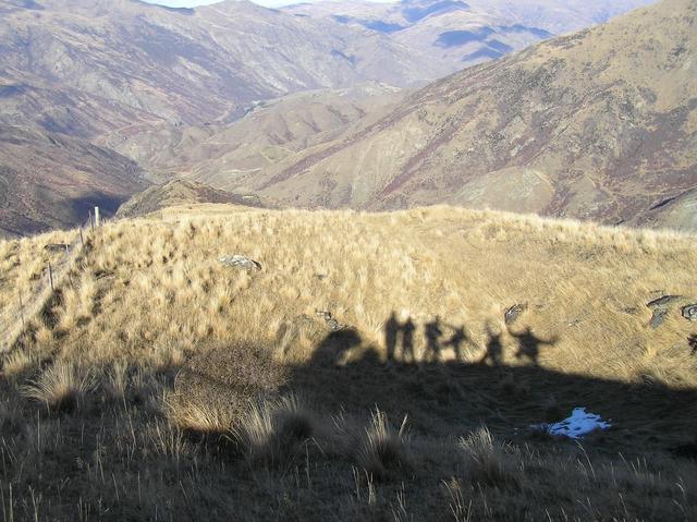 Our shadows, looking to the southwest, showing the Gentle Annie Valley in the distance that we hiked up.