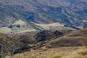 #7: A telephoto view down to Highway 6 and the small farming settlement of Gibbston