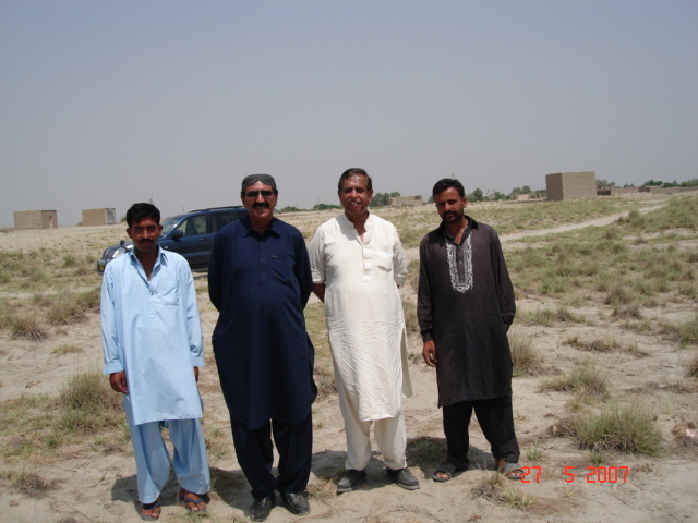 Mr Kasim and myself with locals at confluence point