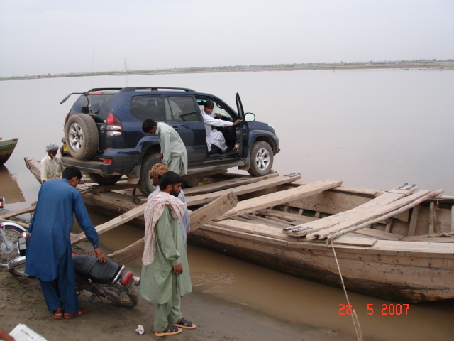 Ayoob driver in jeep after loading it on Boat