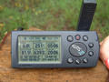 #3: Debra holding the GPS reading N50°00'00.0" E020°00'00.0"