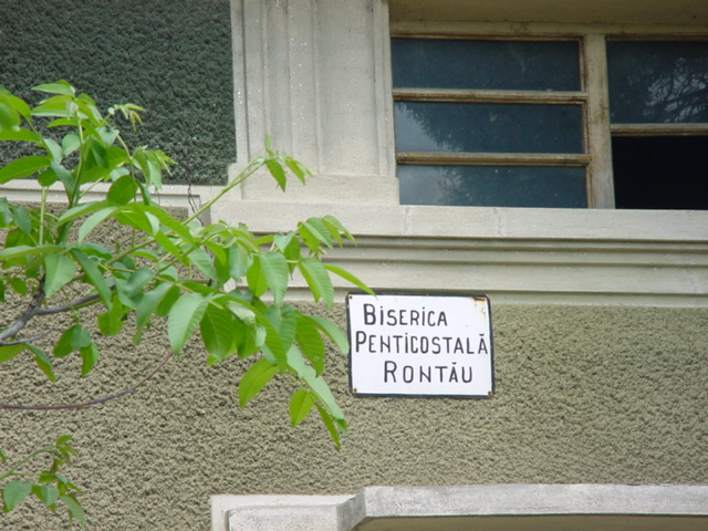 The sign says 'Rontau Penticostal Church'/Biserica Penticostala Rontau