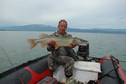 #5: Boatman Peter Logunov, assisting to visit the CP, with a successful trophy