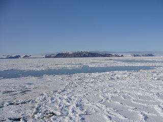 #1: View north: Gallja (Hall) Island with Cape Tegetthoff (center right)