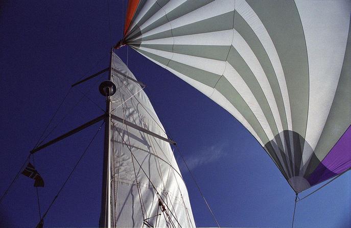 With the spinnaker up, sailing along the 80N