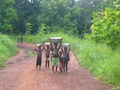 #7: Girl carrying 20 litres of water and her brother