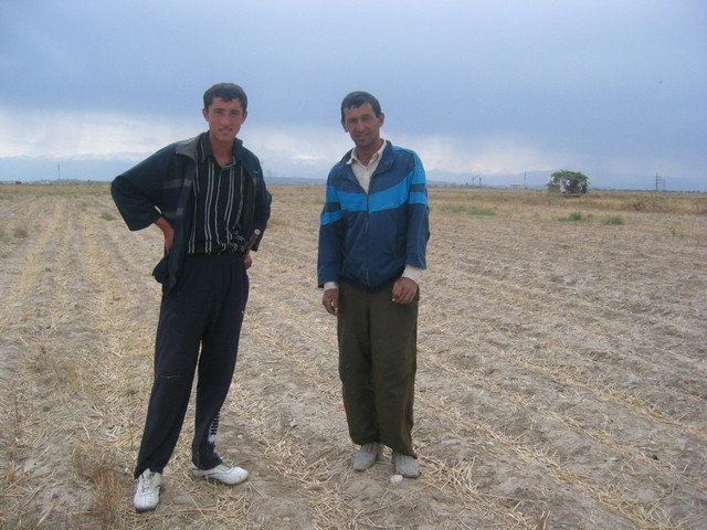 Two Farmers Working in the Fields