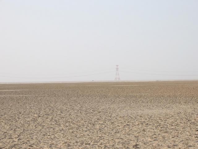 The coastal sabkha of Abū Zaby at 24N 54E