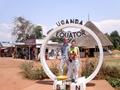 #6: Laurel and Brian crossing the equator on the main road from Kampala (note funnel in foreground).