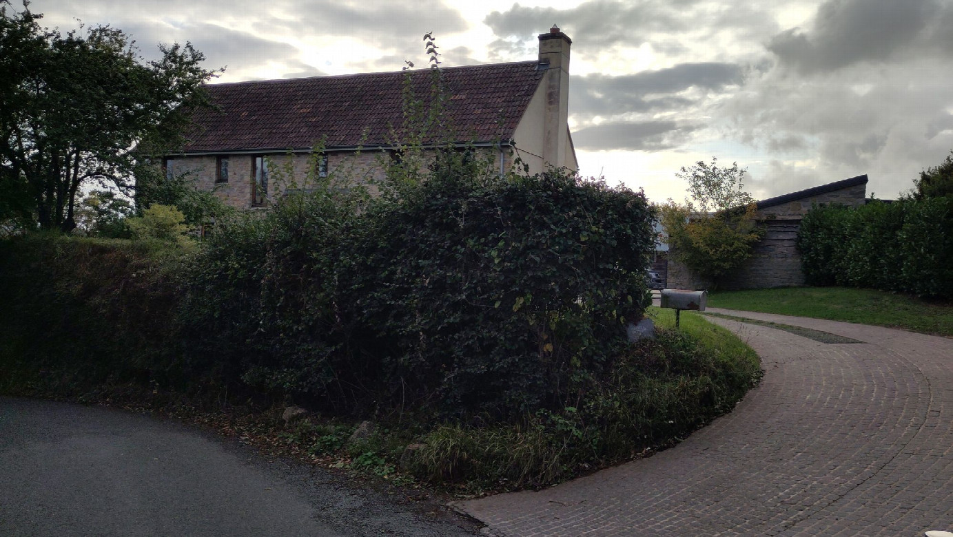 house 150 m NE of the CP