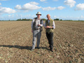 #7: Alan and Gerald - two men out standing in their field.