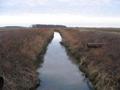 #8: Picture of irrigation ditch from the gravel road
