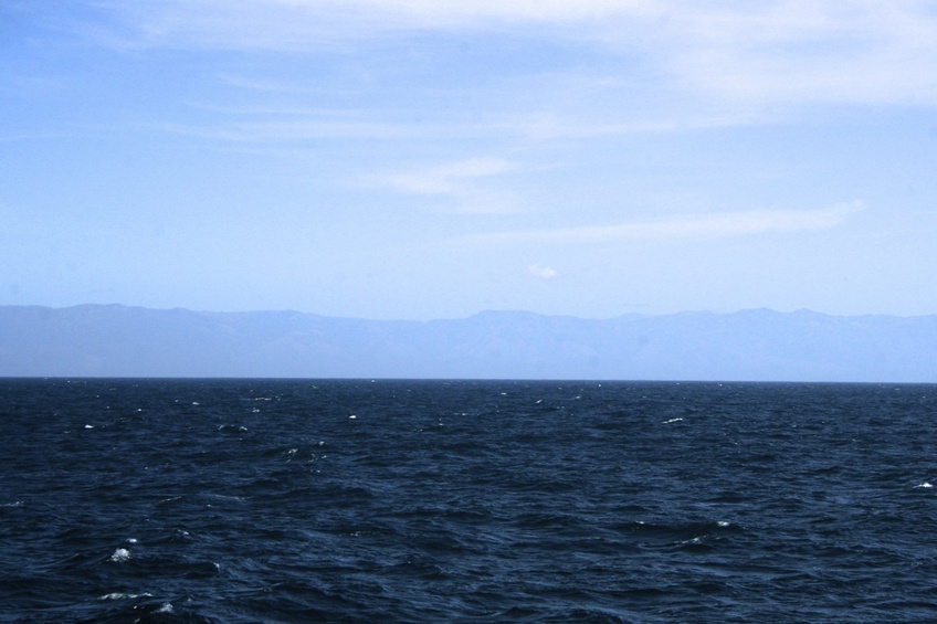 Looking east towards Lopez Point.  The confluence is 21 NM @ 266 degrees true from Lopez Point.   The highest mountain on the horizon, is Cone Peak, at 5,155 ft.