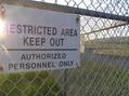 #6: Soon to disappear?  This weapons facility has closed and the fences and signs will likely be removed someday.