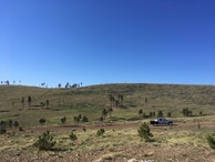 #2: Cody's truck parked just over the ridge to the south of the confluence on Tercio Ranch land