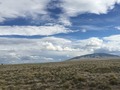 #6: View to the south from the confluence, of one of the shield volcanoes in New Mexico.