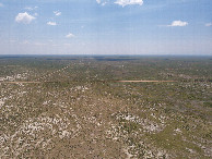 #10: View South (down the San Luis Valley, towards County Road T, less than 1/2 mile away), from 120m above the point