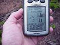 #3: Raindrops on GPS unit as it records the confluence's location.