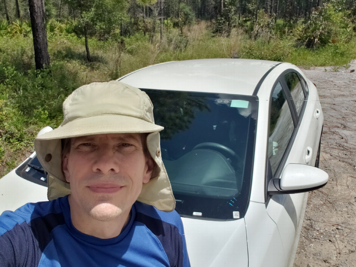 Me by my car relaxed after not being blown up