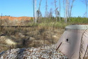 #6: View to the north showing the confluence, behind the thorns and shrubs, showing new sewer as part of the new housing development being constructed here.