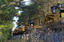 #7: A train - carrying new Caterpillar vehicles - passes between the road and the confluence point.  (It's nice to see that manufacturing in the U.S. is still alive!)
