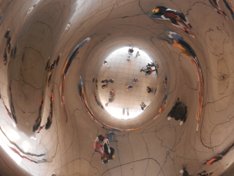 The Confluence Hunters take a picture from below the “omphalos” in “the Bean.”