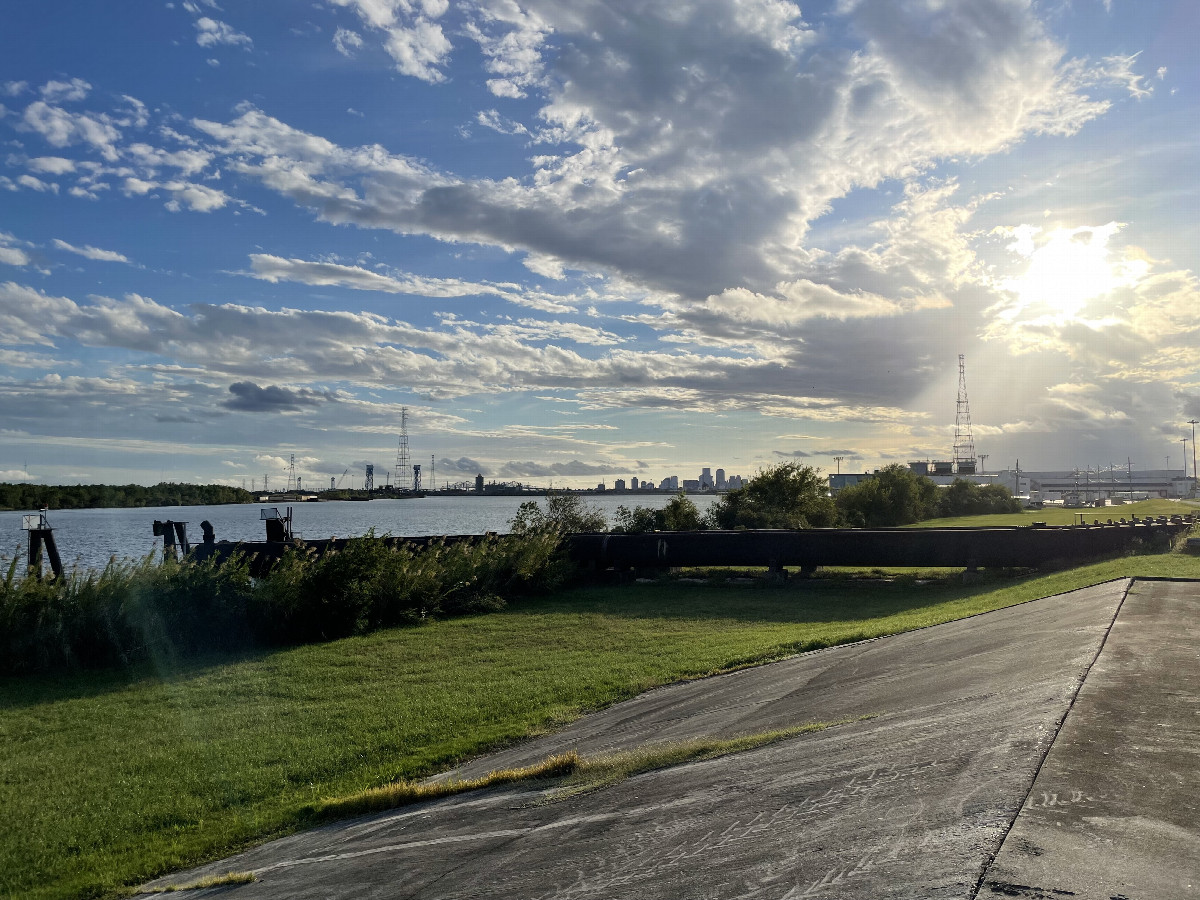 Back at the pump station levee, looking SW at New Orleans skyline and industrial rigmarole along the Intracoastal Waterway