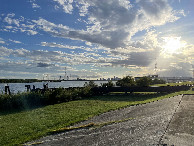 #11: Back at the pump station levee, looking SW at New Orleans skyline and industrial rigmarole along the Intracoastal Waterway