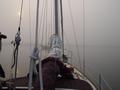 #8: Alliance underway, departing the McKinley Marina in Milwaukee, WI in the fog as the sun rises in the east